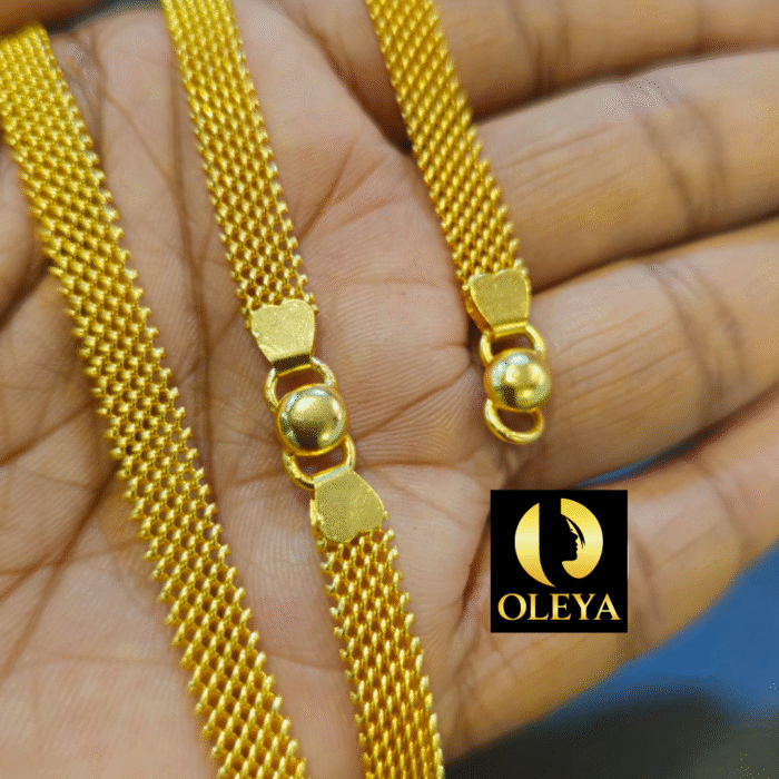 Gold-plated anklet featuring fine link chain and glossy shine