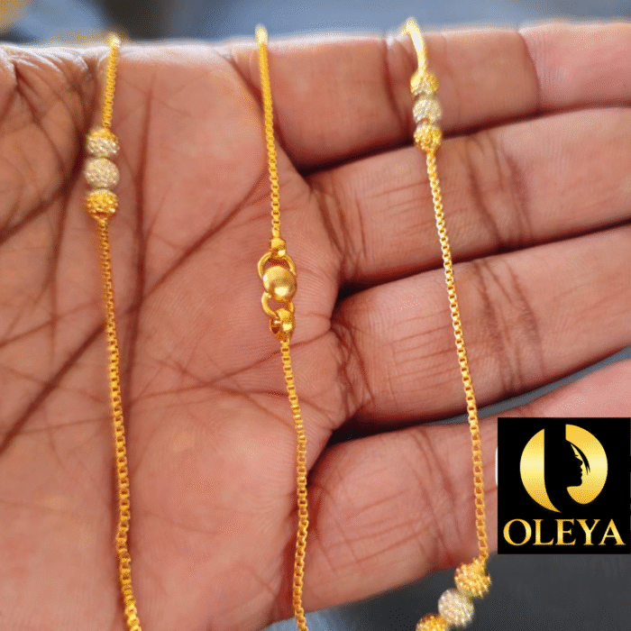 Gold-plated anklet featuring fine link chain and glossy shine