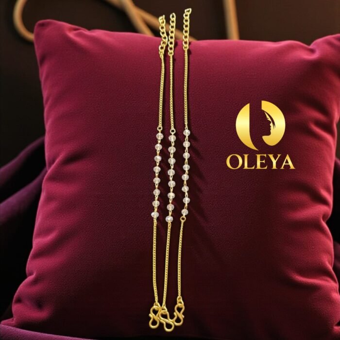 Close-up of shiny gold plated bracelet