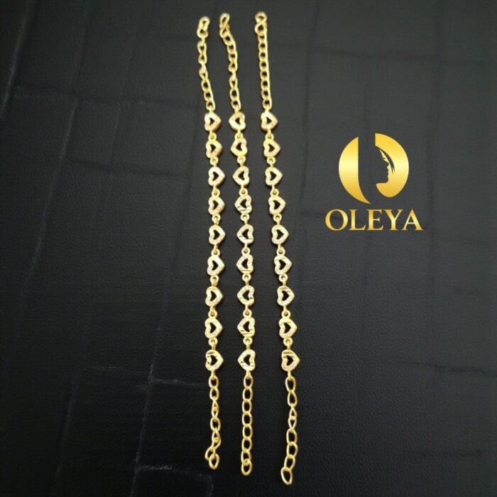 Close-up of shiny gold plated bracelet