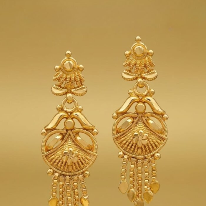 Simple and stylish gold-plated hanging earrings displayed on a golden colour surface.